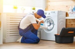 A man doing washing machine repair in brisbane